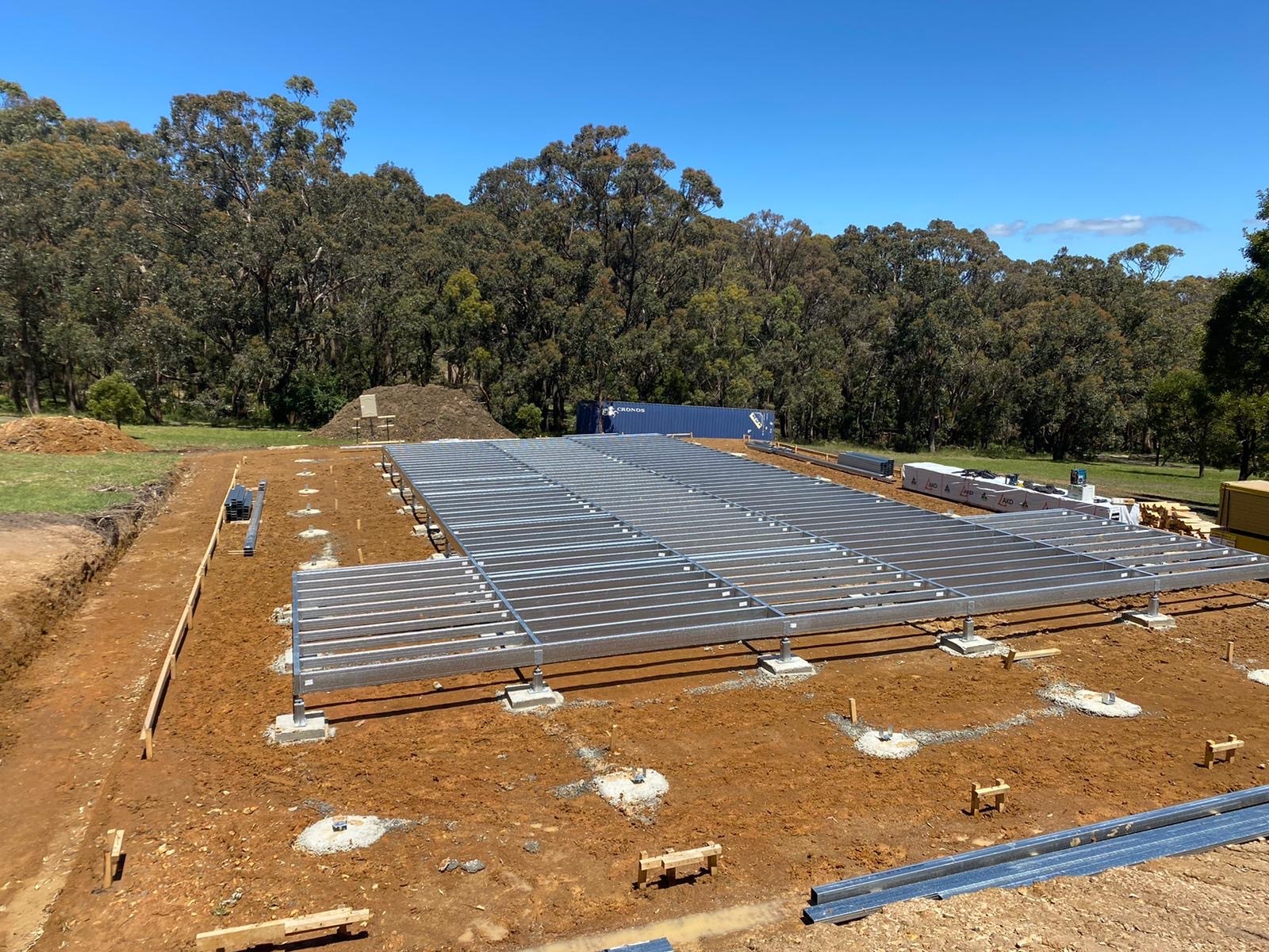 Frontline Construction Group — steel floor frame foundation on build site